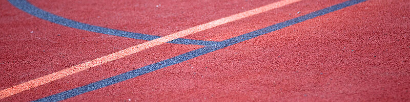 AdobeStock_23434366 Der Boden eines Sportplatz