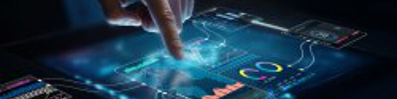 AdobeStock_1503727973 Eine Person tippt auf einen Bildschirm